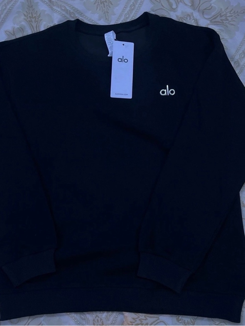 ALO Yoga Black Pullover with Tag Detail